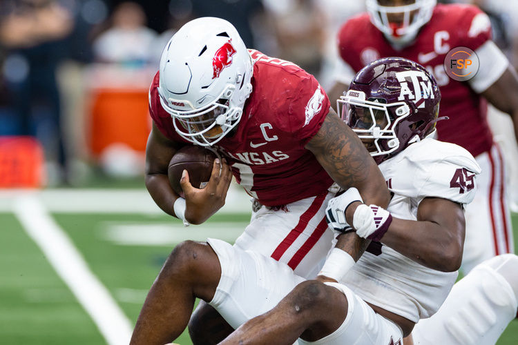 ARLINGTON, TX - SEPTEMBER 30: Arkansas Razorbacks quarterback KJ Jefferson (#1) is sacked byTexas A&M Aggies linebacker Edgerrin Cooper (#45) during the  Southwest Classic college football game between the Texas A&M Aggies and the Arkansas Razorbacks on September 30, 2023 at AT&T Stadium in Arlington, TX.  (Photo by Matthew Visinsky/Icon Sportswire)