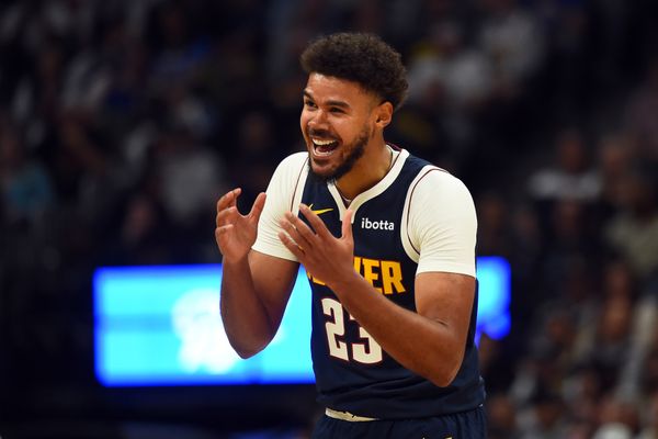 Oct 25, 2025; Denver, Colorado, USA; Denver Nuggets forward Cameron Johnson (23) reacts after being called for a foul during the first half against the Phoenix Suns at Ball Arena. Mandatory Credit: Christopher Hanewinckel-Imagn Images