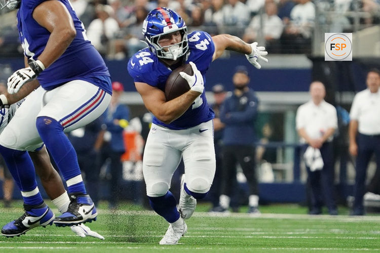 Sep 14, 2025; Arlington, Texas, USA; New York Giants running back Cam Skattebo (44) runs with the ball against the Dallas Cowboys during the fourth quarter at AT&T Stadium. Credit: Raymond Carlin III-Imagn Images