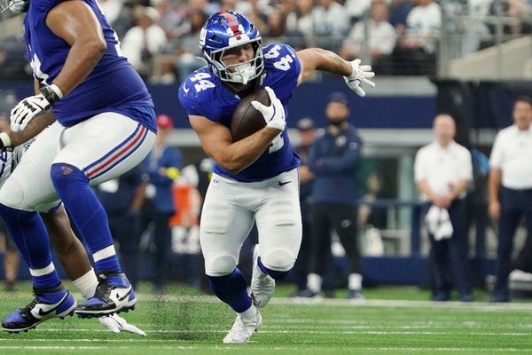 Sep 14, 2025; Arlington, Texas, USA; New York Giants running back Cam Skattebo (44) runs with the ball against the Dallas Cowboys during the fourth quarter at AT&T Stadium. Mandatory Credit: Raymond Carlin III-Imagn Images
