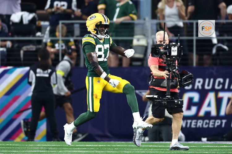 Sep 28, 2025; Arlington, Texas, USA; Green Bay Packers wide receiver Romeo Doubs (87) celebrates after scoring a touchdown against the Dallas Cowboys in the second quarter at AT&T Stadium. Credit: Kevin Jairaj-Imagn Images