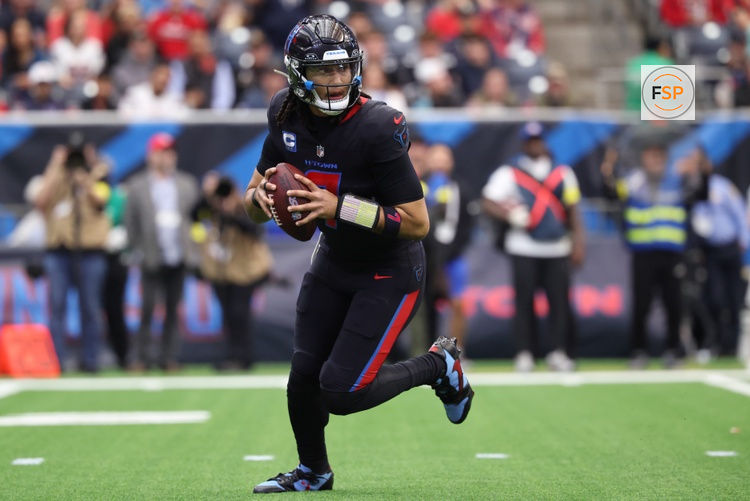 Jan 4, 2026; Houston, Texas, USA;  Houston Texans quarterback C.J. Stroud (7) rolls out against the Indianapolis Colts during the first half at NRG Stadium. Credit: Troy Taormina-Imagn Images