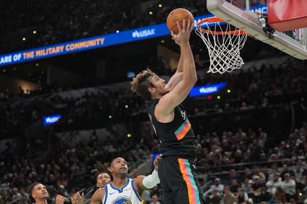 Nov 12, 2025; San Antonio, Texas, USA;  San Antonio Spurs center Luke Kornet (7) shoots in the first half against the Golden State Warriors  Frost Bank Center. Mandatory Credit: Daniel Dunn-Imagn Images