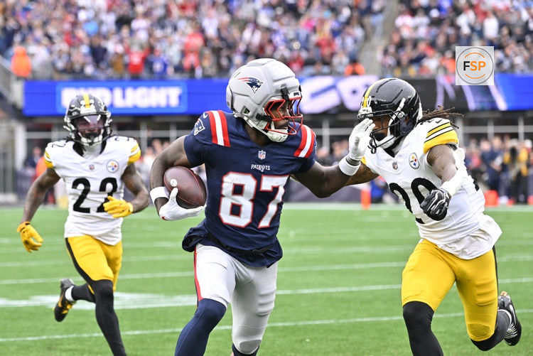 Sep 20, 2026; Foxborough, Massachusetts, USA;  New England Patriots wide receiver Romeo Doubs (87) runs after a catch against the Pittsburgh Steelers at Gillette Stadium.  Credit: Eric Canha-Imagn Images