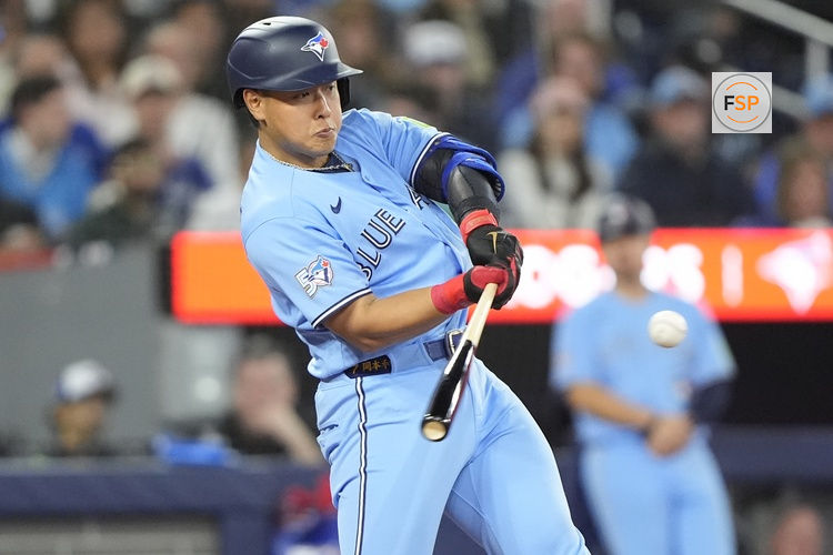Apr 8, 2026; Toronto, Ontario, CAN; Toronto Blue Jays third baseman Kazuma Okamoto (7) during an at bat against the Los Angeles Dodgers during the sixth inning at Rogers Centre. Credit: John E. Sokolowski-Imagn Images