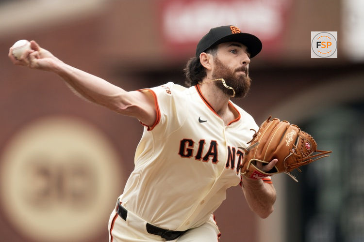 Apr 26, 2025; San Francisco, California, USA; San Francisco Giants pitcher Ryan Walker (74) delivers a pitch against the Texas Rangers during the ninth inning at Oracle Park. Credit: D. Ross Cameron-Imagn Images