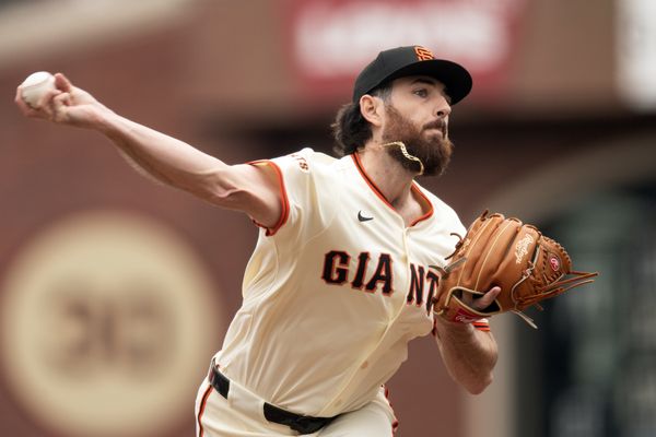 Apr 26, 2025; San Francisco, California, USA; San Francisco Giants pitcher Ryan Walker (74) delivers a pitch against the Texas Rangers during the ninth inning at Oracle Park. Mandatory Credit: D. Ross Cameron-Imagn Images