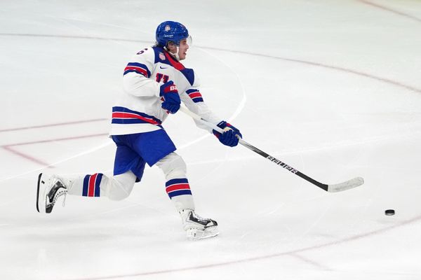 Feb 22, 2026; Milan, Italy; Jack Hughes of the United States scores the game winning goal against Canada the men's ice hockey gold medal game during the Milano Cortina 2026 Olympic Winter Games at Milano Santagiulia Ice Hockey Arena. Mandatory Credit: James Lang-Imagn Images