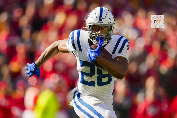 Nov 23, 2025; Kansas City, Missouri, USA; Indianapolis Colts running back Jonathan Taylor (28) runs the ball during the first half against the Kansas City Chiefs at GEHA Field at Arrowhead Stadium. Credit: Jay Biggerstaff-Imagn Images