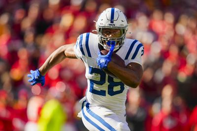 Nov 23, 2025; Kansas City, Missouri, USA; Indianapolis Colts running back Jonathan Taylor (28) runs the ball during the first half against the Kansas City Chiefs at GEHA Field at Arrowhead Stadium. Mandatory Credit: Jay Biggerstaff-Imagn Images