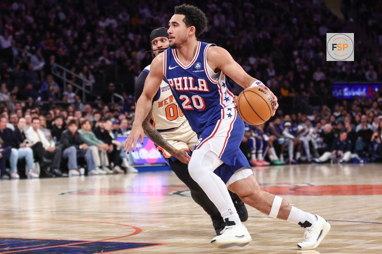 Jan 3, 2026; New York, New York, USA; Philadelphia 76ers guard Jared McCain (20) drives past New York Knicks guard Jordan Clarkson (00) in the third quarter at Madison Square Garden. Credit: Wendell Cruz-Imagn Images