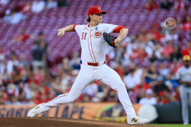 Jun 2, 2025; Cincinnati, Ohio, USA; Cincinnati Reds starting pitcher Brady Singer (51) pitches against the Milwaukee Brewers in the first inning at Great American Ball Park. Credit: Katie Stratman-Imagn Images