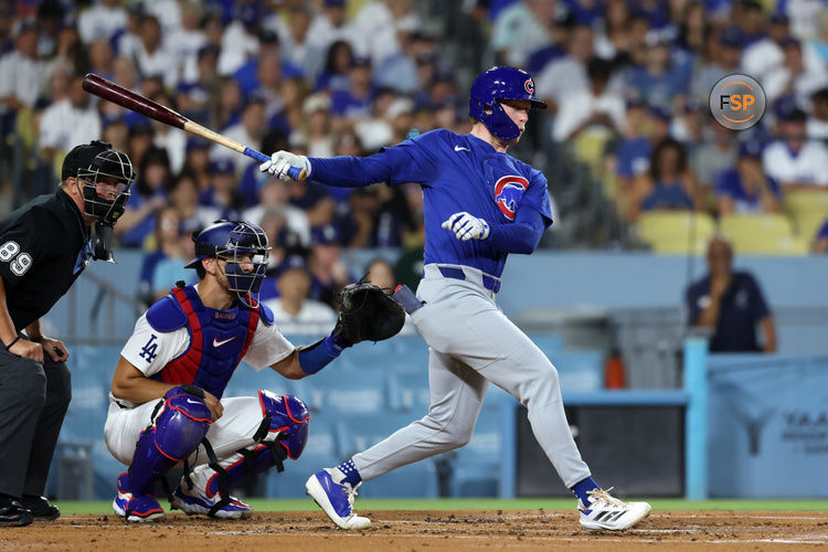 Sep 10, 2024; Los Angeles, California, USA;  Chicago Cubs center fielder Pete Crow-Armstrong (52) hits a RBI single during the second inning against the Los Angeles Dodgers at Dodger Stadium. Credit: Kiyoshi Mio-Imagn Images