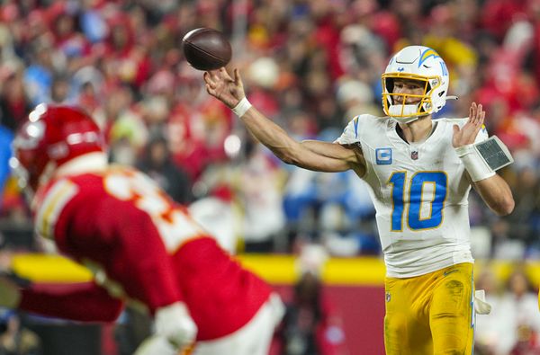Dec 8, 2024; Kansas City, Missouri, USA; Los Angeles Chargers quarterback Justin Herbert (10) throws a pass during the second half against the Kansas City Chiefs at GEHA Field at Arrowhead Stadium. Mandatory Credit: Jay Biggerstaff-Imagn Images