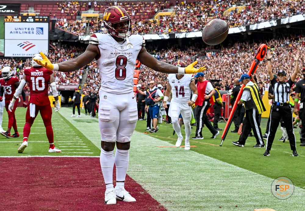 LANDOVER, MD - SEPTEMBER 10: Washington Commanders running back Brian Robinson Jr. (8) reacts after scoring a touchdown during the NFL game between the Arizona Cardinals and the Washington Commanders on September 10, 2023 at Fed Ex Field in Landover, MD. (Photo by Mark Goldman/Icon Sportswire)