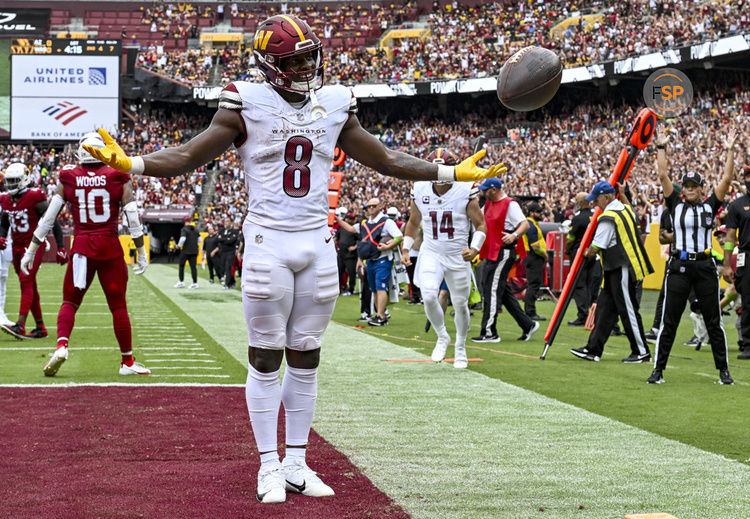 LANDOVER, MD - SEPTEMBER 10: Washington Commanders running back Brian Robinson Jr. (8) reacts after scoring a touchdown during the NFL game between the Arizona Cardinals and the Washington Commanders on September 10, 2023 at Fed Ex Field in Landover, MD. (Photo by Mark Goldman/Icon Sportswire)