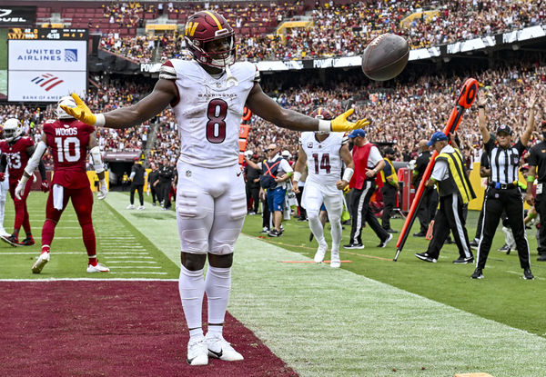 LANDOVER, MD - SEPTEMBER 10: Washington Commanders running back Brian Robinson Jr. (8) reacts after scoring a touchdown during the NFL game between the Arizona Cardinals and the Washington Commanders on September 10, 2023 at Fed Ex Field in Landover, MD. (Photo by Mark Goldman/Icon Sportswire)