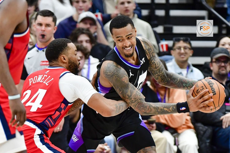 Feb 13, 2025; Salt Lake City, Utah, USA; LA Clippers guard Norman Powell (24) defends Utah Jazz forward/center John Collins (20) during the second half at the Delta Center. Credit: Christopher Creveling-Imagn Images