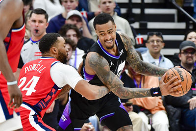 Feb 13, 2025; Salt Lake City, Utah, USA; LA Clippers guard Norman Powell (24) defends Utah Jazz forward/center John Collins (20) during the second half at the Delta Center. Mandatory Credit: Christopher Creveling-Imagn Images