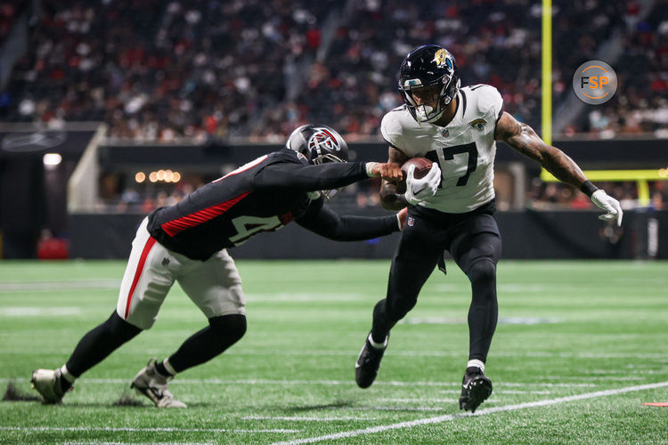 Aug 23, 2024; Atlanta, Georgia, USA; Jacksonville Jaguars tight end Evan Engram (17) is pushed out of bounds by Atlanta Falcons linebacker Bradlee Anae (47) in the second quarter at Mercedes-Benz Stadium. Credit: Brett Davis-USA TODAY Sports