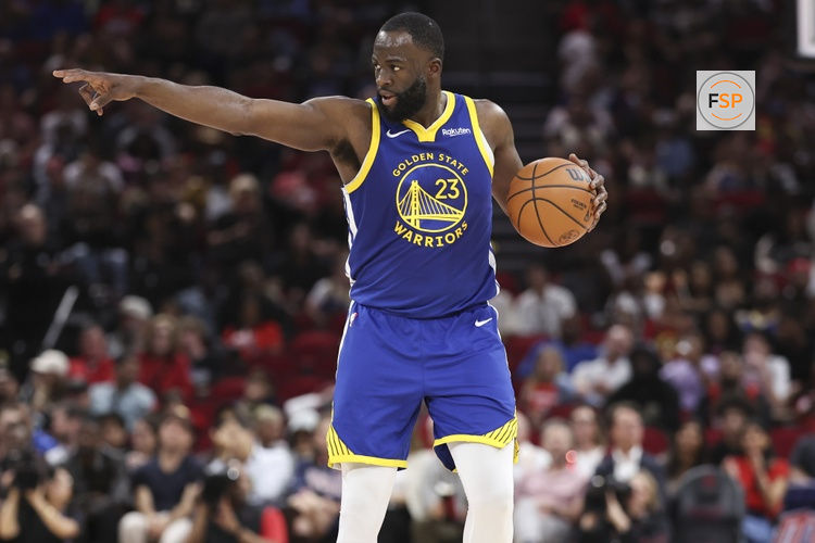 Mar 5, 2026; Houston, Texas, USA; Golden State Warriors forward Draymond Green (23) brings the ball up the court during the second quarter against the Houston Rockets at Toyota Center. Credit: Troy Taormina-Imagn Images