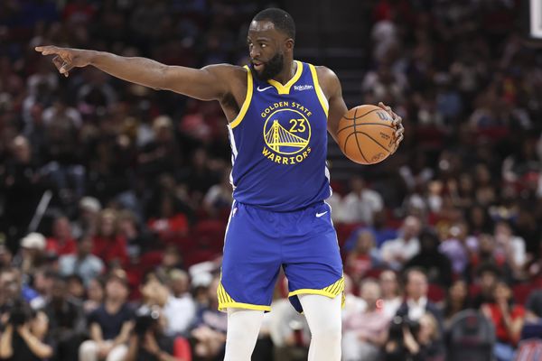 Mar 5, 2026; Houston, Texas, USA; Golden State Warriors forward Draymond Green (23) brings the ball up the court during the second quarter against the Houston Rockets at Toyota Center. Mandatory Credit: Troy Taormina-Imagn Images