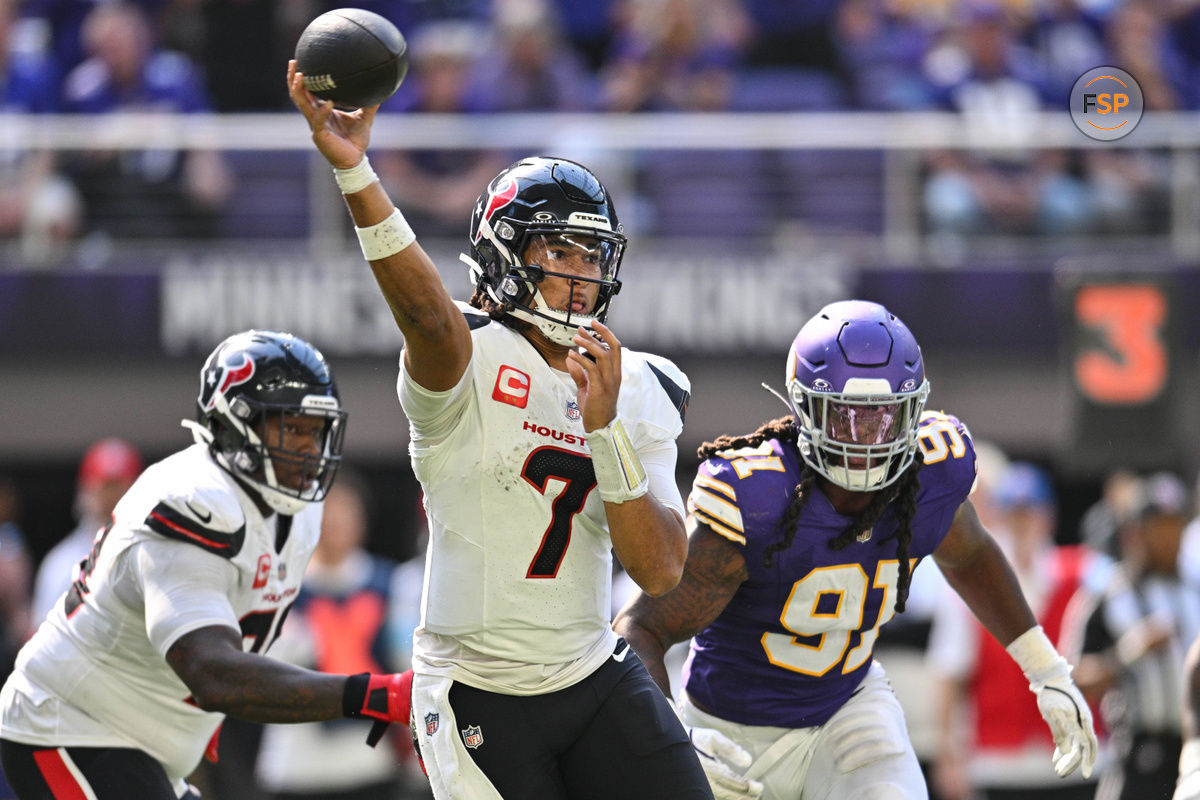 Sep 22, 2024; Minneapolis, Minnesota, USA; Houston Texans quarterback C.J. Stroud (7) throws a pass as Minnesota Vikings linebacker Pat Jones II (91) pursues during the third quarter at U.S. Bank Stadium. Credit: Jeffrey Becker-Imagn Images