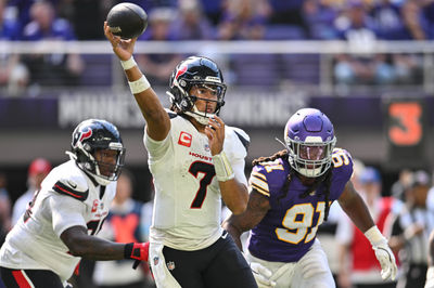 Sep 22, 2024; Minneapolis, Minnesota, USA; Houston Texans quarterback C.J. Stroud (7) throws a pass as Minnesota Vikings linebacker Pat Jones II (91) pursues during the third quarter at U.S. Bank Stadium. Mandatory Credit: Jeffrey Becker-Imagn Images