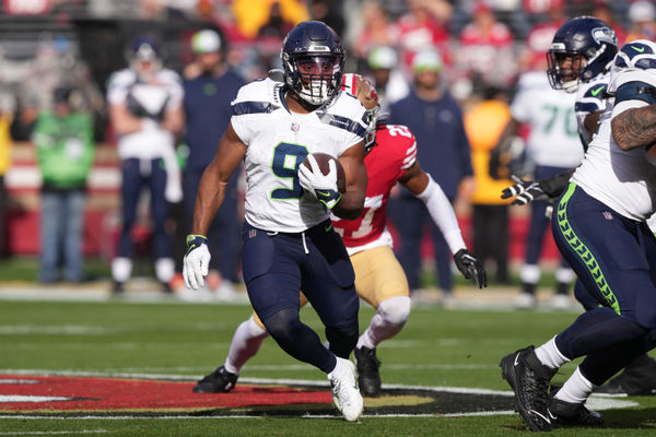 Dec 10, 2023; Santa Clara, California, USA; Seattle Seahawks running back Kenneth Walker III (9) carries the ball against the San Francisco 49ers during the first quarter at Levi's Stadium. Mandatory Credit: Darren Yamashita-USA TODAY Sports