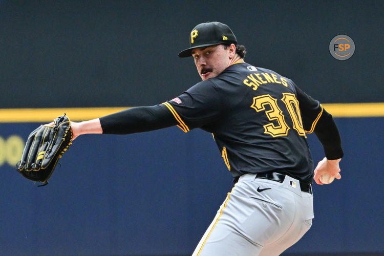 Jul 11, 2024; Milwaukee, Wisconsin, USA; Pittsburgh Pirates pitcher Paul Skenes (30) pitches against the Milwaukee Brewers in the first inning at American Family Field. Credit: Benny Sieu-USA TODAY Sports