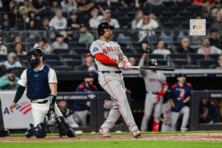 Jun 8, 2025; Bronx, New York, USA; Boston Red Sox designated hitter Rafael Devers (11) reacts after hitting a solo home run against the New York Yankees during the ninth inning at Yankee Stadium. Credit: John Jones-Imagn Images