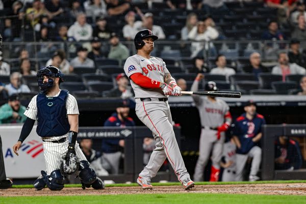 Jun 8, 2025; Bronx, New York, USA; Boston Red Sox designated hitter Rafael Devers (11) reacts after hitting a solo home run against the New York Yankees during the ninth inning at Yankee Stadium. Mandatory Credit: John Jones-Imagn Images