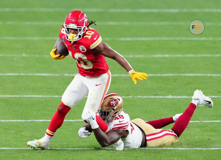 Feb 11, 2024; Paradise, Nevada, USA; Kansas City Chiefs running back Isiah Pacheco (10) is tackled by San Francisco 49ers linebacker Oren Burks (48) during overtime in Super Bowl LVIII at Allegiant Stadium. Credit: Stephen R. Sylvanie-USA TODAY Sports