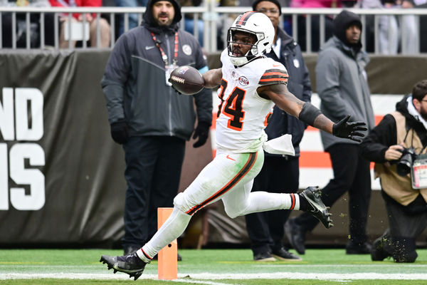 Dec 15, 2024; Cleveland, Ohio, USA; Cleveland Browns running back Jerome Ford (34) scores a touchdown during the second half against the Kansas City Chiefs at Huntington Bank Field. Mandatory Credit: Ken Blaze-Imagn Images