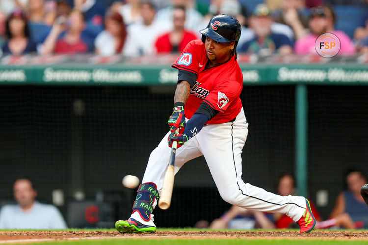 CLEVELAND, OH - JULY 23: Cleveland Guardians third baseman Jose Ramirez (11) singles to drive in a run during the sixth inning of the Major League Baseball game between the Detroit Tigers and Cleveland Guardians on July 23, 2024, at Progressive Field in Cleveland, OH. (Photo by Frank Jansky/Icon Sportswire)