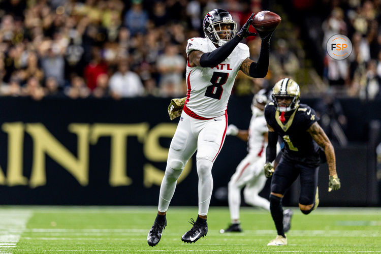 Nov 10, 2024; New Orleans, Louisiana, USA;  Atlanta Falcons tight end Kyle Pitts (8) catches a pass on and stopped by New Orleans Saints cornerback Alontae Taylor (1) on fourth down during the second half at Caesars Superdome. Credit: Stephen Lew-Imagn Images