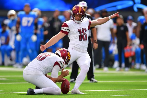 Oct 5, 2025; Inglewood, California, USA; Washington Commanders kicker Matt Gay (16) kicks a field goal against the Los Angeles Chargers in the first half  at SoFi Stadium. Mandatory Credit: Gary A. Vasquez-Imagn Images