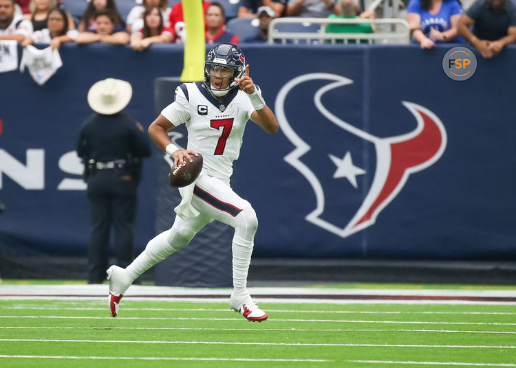 HOUSTON, TX - SEPTEMBER 17:  Houston Texans quarterback C.J. Stroud (7) carries the ball as he looks for an open receiver in the fourth quarter during the NFL game between the Indianapolis Colts and Houston Texans on September 17, 2023 at NRG Stadium in Houston, Texas.  (Photo by Leslie Plaza Johnson/Icon Sportswire)