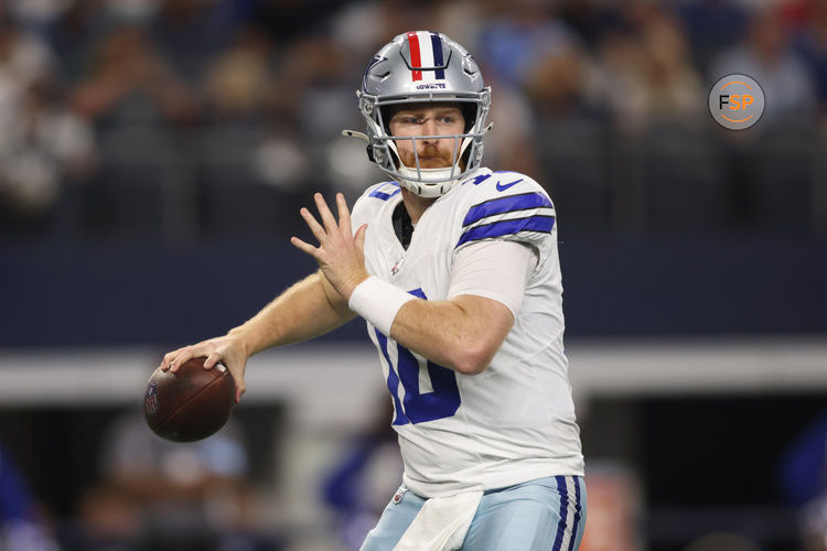 Nov 10, 2024; Arlington, Texas, USA; Dallas Cowboys quarterback Cooper Rush (10) throws a pass against the Philadelphia Eagles in the third quarter at AT&T Stadium. Credit: Tim Heitman-Imagn Images