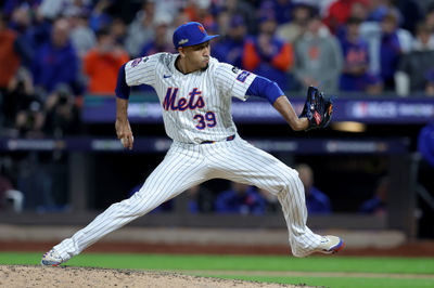 Oct 18, 2024; New York City, New York, USA; New York Mets relief pitcher Edwin Diaz (39) pitches against the Los Angeles Dodgers during the ninth inning of game five of the NLCS during the 2024 MLB playoffs at Citi Field. Mandatory Credit: Brad Penner-Imagn Images