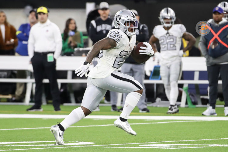 INGLEWOOD, CA - DECEMBER 08: Las Vegas Raiders running back Josh Jacobs (28) runs during the NFL game between the Las Vegas Raiders and the Los Angeles Rams on December 08, 2022 in Inglewood, CA. (Photo by Jevone Moore/Icon Sportswire)