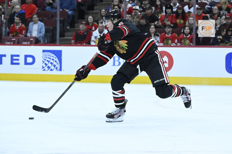 Jan 30, 2026; Chicago, Illinois, USA;  Chicago Blackhawks defenseman Connor Murphy (5) moves the puck against the Columbus Blue Jackets during the first period at the United Center. Credit: Matt Marton-Imagn Images