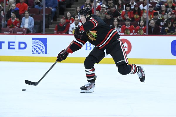 Jan 30, 2026; Chicago, Illinois, USA;  Chicago Blackhawks defenseman Connor Murphy (5) moves the puck against the Columbus Blue Jackets during the first period at the United Center. Mandatory Credit: Matt Marton-Imagn Images
