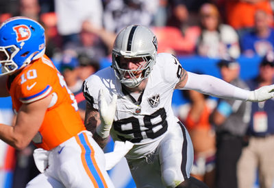 Oct 6, 2024; Denver, Colorado, USA; Las Vegas Raiders defensive end Maxx Crosby (98) chases down Denver Broncos quarterback Bo Nix (10) for a sack in the second half at Empower Field at Mile High. Mandatory Credit: Ron Chenoy-Imagn Images