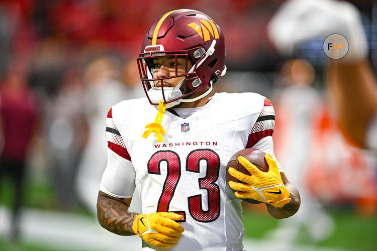 ATLANTA, GA – OCTOBER 15:  Washington running back Chris Rodriguez Jr. (23) warms up prior to the start of the NFL game between the Washington Commanders and the Atlanta Falcons on October 15th, 2023 at Mercedes-Benz Stadium in Atlanta, GA.  (Photo by Rich von Biberstein/Icon Sportswire)