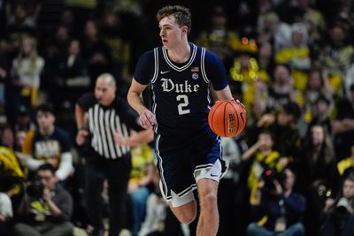 Jan 25, 2025; Winston-Salem, North Carolina, USA; Duke Blue Devils guard Cooper Flagg (2) handles the ball against the Wake Forest Demon Deacons during the second half at Lawrence Joel Veterans Memorial Coliseum. Mandatory Credit: Jim Dedmon-Imagn Images