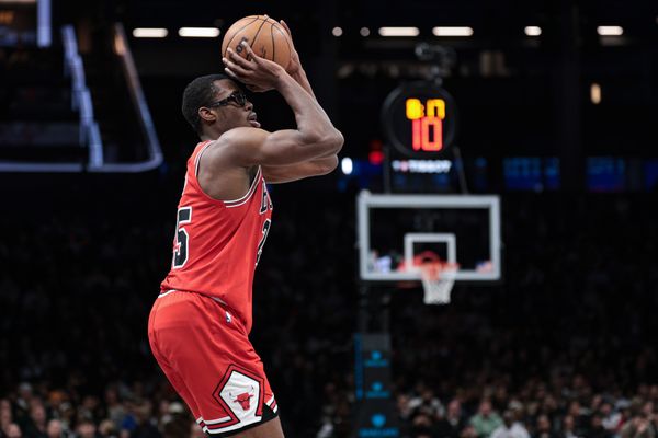 Jan 16, 2026; Brooklyn, New York, USA; Chicago Bulls forward Jalen Smith (25) makes a three point basket during the second half against the Brooklyn Nets at Barclays Center. Mandatory Credit: Vincent Carchietta-Imagn Images