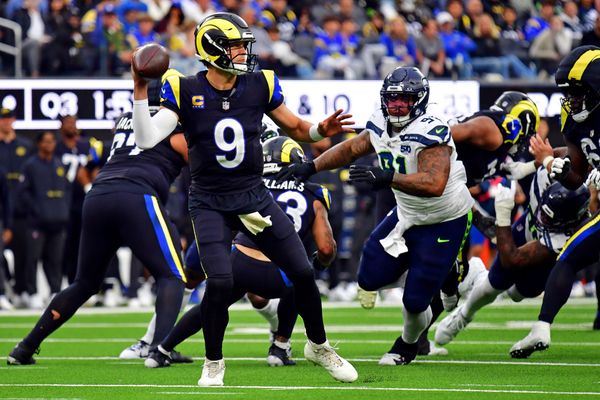 Nov 16, 2025; Inglewood, California, USA; Los Angeles Rams quarterback Matthew Stafford (9) throws a during the second half against the Seattle Seahawks at SoFi Stadium. Mandatory Credit: Gary A. Vasquez-Imagn Images