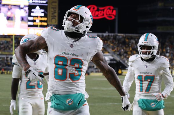 Dec 15, 2025; Pittsburgh, Pennsylvania, USA; Miami Dolphins tight end Darren Waller (83) reacts after scoring a touchdown in the fourth quarter against the Pittsburgh Steelers at Acrisure Stadium. Mandatory Credit: Charles LeClaire-Imagn Images