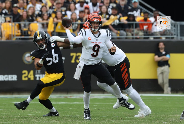 Sep 27, 2026; Pittsburgh, Pennsylvania, USA;  Cincinnati Bengals quarterback Joe Burrow (9) throws during the fourth quarter against Pittsburgh Steelers linebacker Alex Highsmith (56) at Acrisure Stadium.  Credit: Charles LeClaire-Imagn Images
